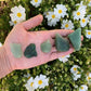 Back view of Grade AA Aventurine raw showing natural surface