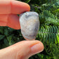 Base detail of Grade A Crazy Lace Agate tumbled stone