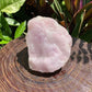 Whole-piece view of Rose Quartz specimen, with natural details visible.