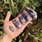 Base detail of Grade AA Chevron Amethyst raw