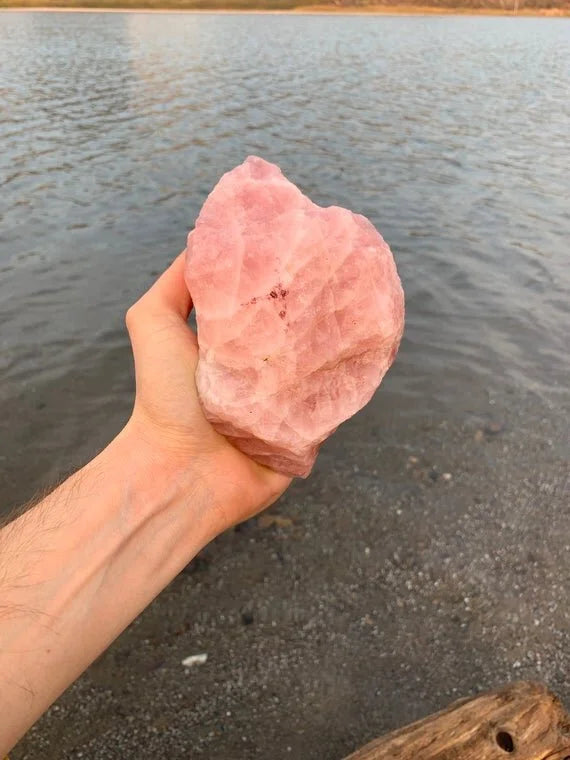 Studio-style view of Rose Quartz raw crystal, linked to Emotional Healing, showing the wear and finish.