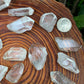 Rear view of Clear Quartz raw point, from Minas Gerais, Brazil, showing natural banding.