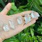Natural light view of a Clear Quartz raw point, Brazil-sourced.