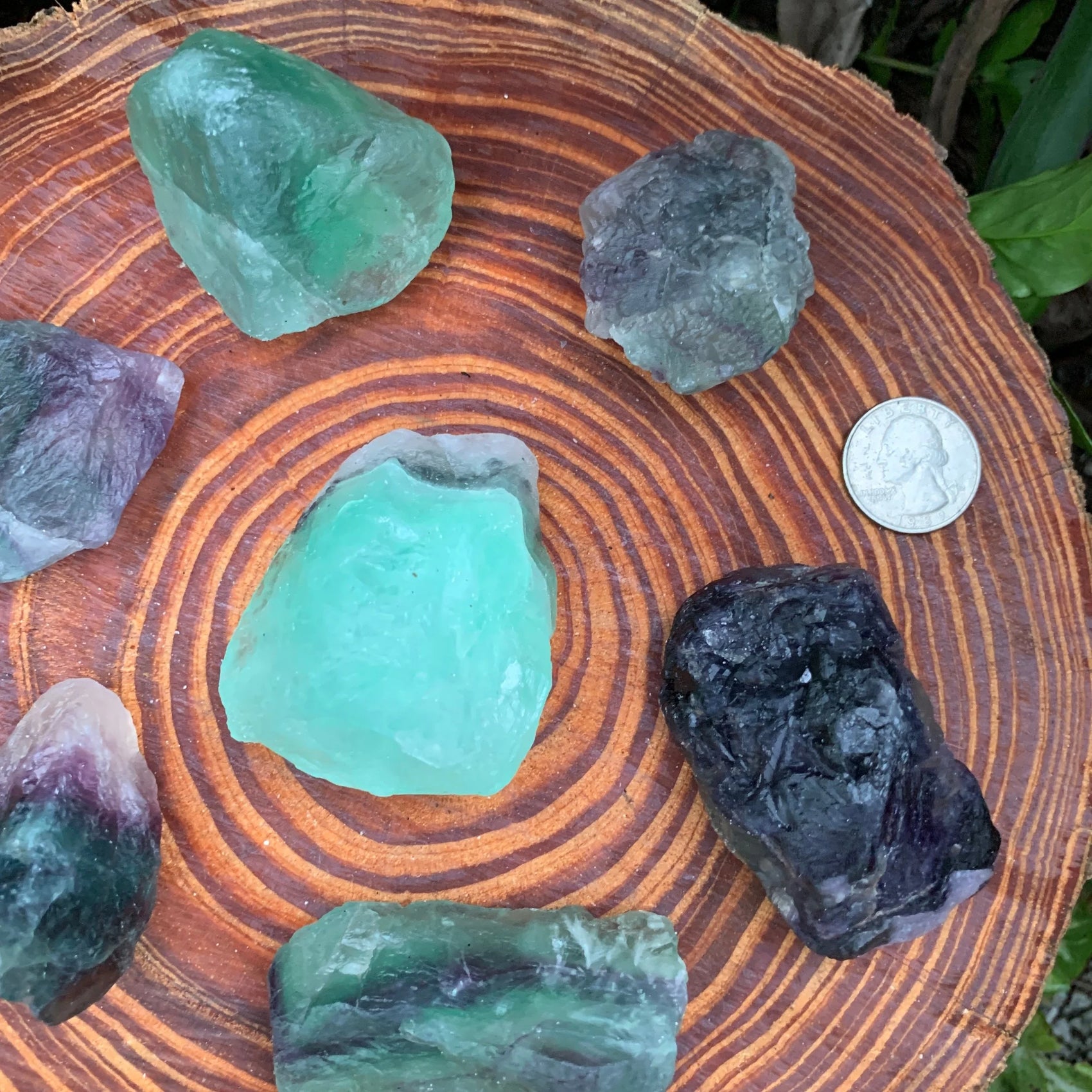 Alternate side of purple Fluorite raw stone, showing earthy tone.