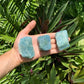 Detail shot of Grade AA Aquamarine raw under natural light