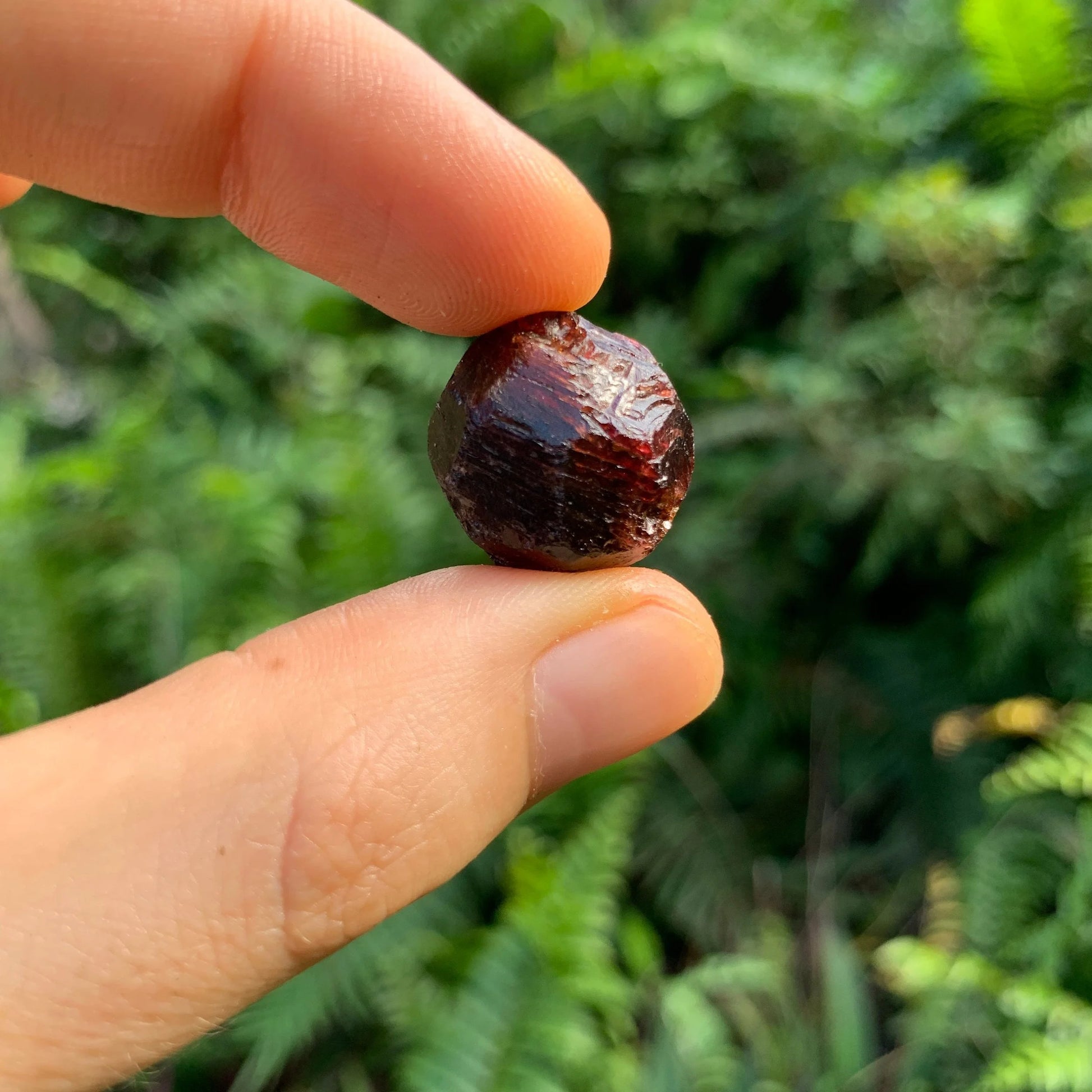 Overhead angle of Grade AA Garnet raw stone, from Minas Gerais, Brazil.
