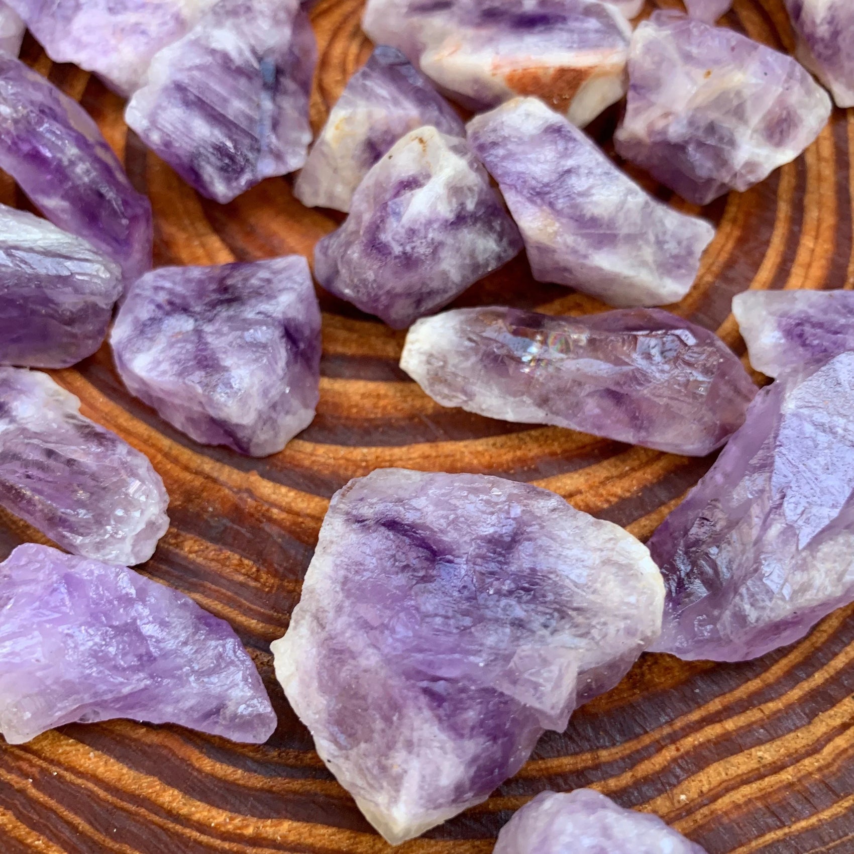 Lateral view of Amethyst raw stone, traditionally used for Stress Relief, showing natural patina.