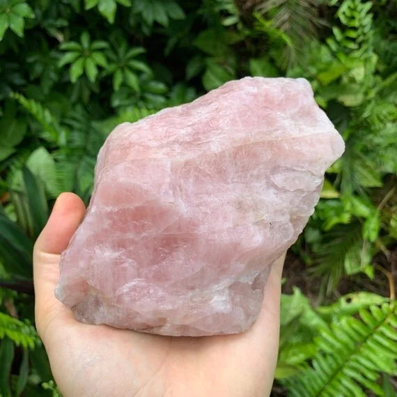 Close-up of Rose Quartz specimen, sourced from Madagascar, showing natural color depth.