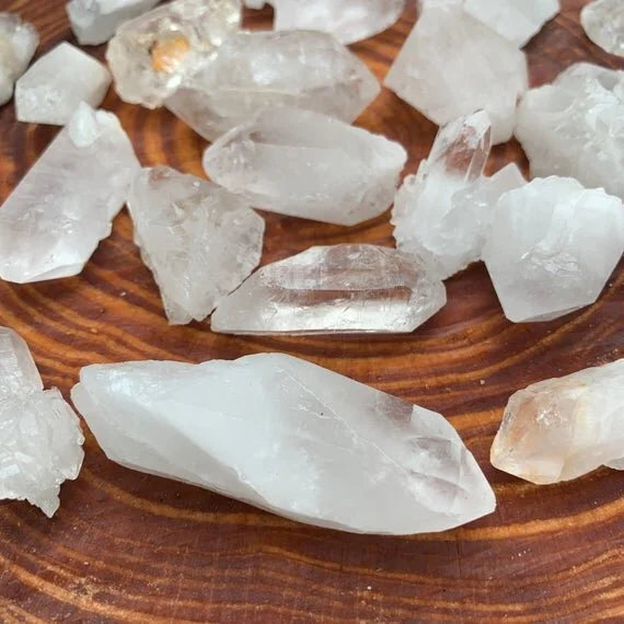Palm-scale view of a Clear Quartz raw point, hand-selected from Arkansas, United States.