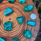 Full profile of Grade AA Malachite tumbled stone ready to ship from Beyond Bohemian