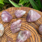 Full profile of Grade AAA Blue Rose Quartz tumbled stone ready to ship from Beyond Bohemian