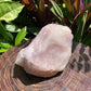Detail shot of Grade AA Rose Quartz specimen under natural light