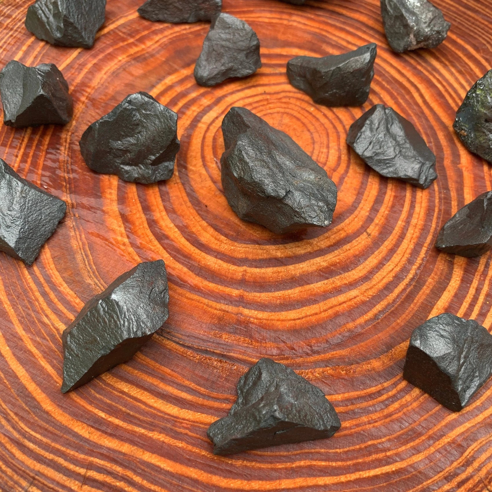 Back view of Grade AA Hematite raw showing natural surface