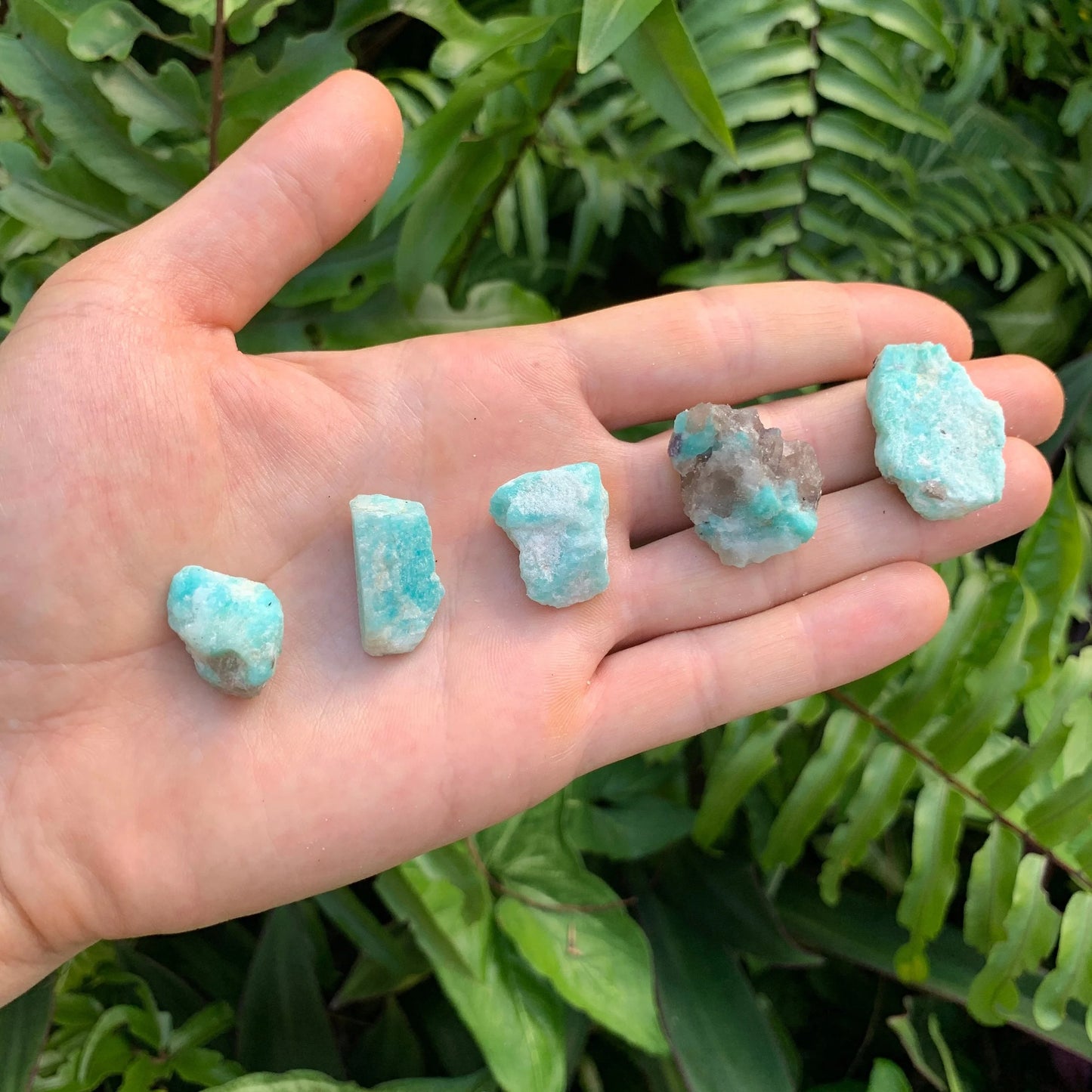 Underside view of Grade AA Amazonite raw stone, hand-selected from Amboasitra, Madagascar, for Stress Relief.