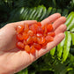 Full profile of Grade AA Carnelian tumbled stone ready to ship from Beyond Bohemian