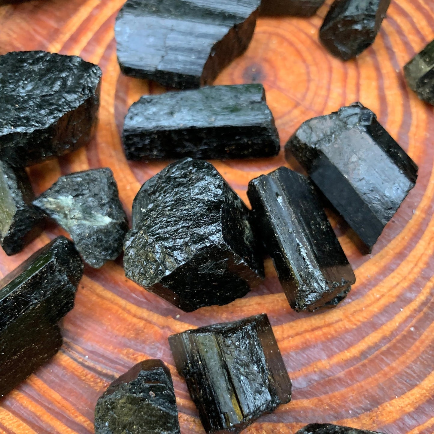 Alternate angle of Grade AA Black Tourmaline raw showing overall shape