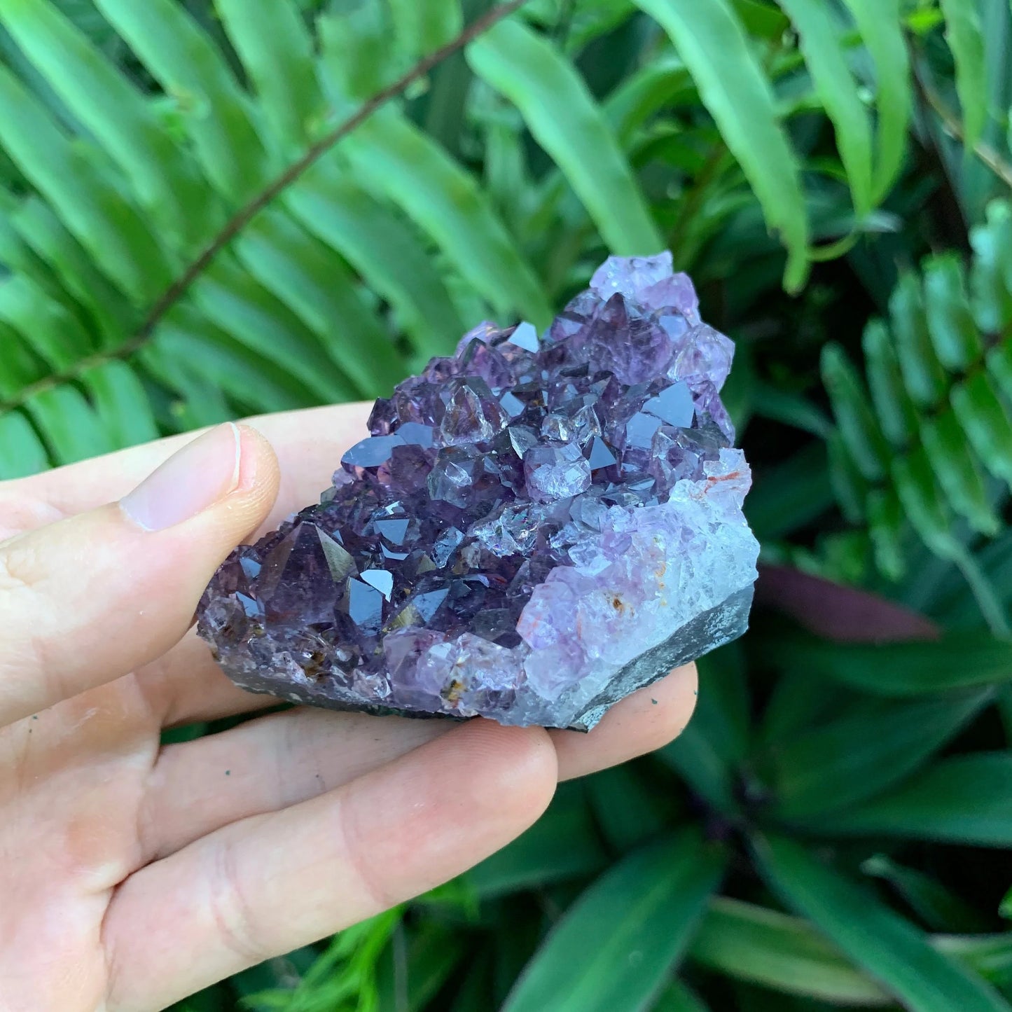 In-hand view of a Amethyst specimen kept close for Stress Relief.