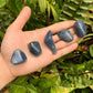 Whole-piece view of Lazulite tumbled stone, linked to Intuition, showing the wear and finish.