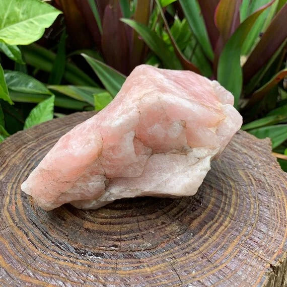 Detail shot of Grade AA Rose Quartz specimen under natural light