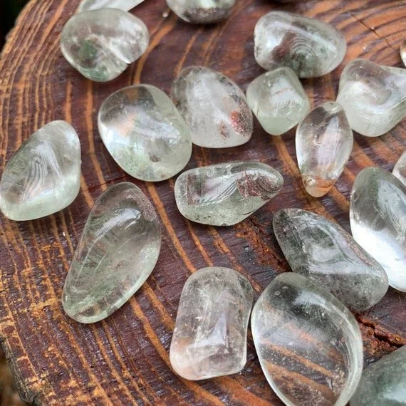 Close view of a Lodolite tumble revealing garden-quartz inclusions, Grade AA, from Brazil