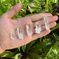Side profile of clear Lemurian Quartz raw point, Colombia-sourced, showing natural variation.