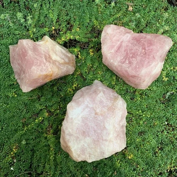 Bird's-eye view of pink Rose Quartz raw stone, Madagascar-sourced, showing natural sheen.
