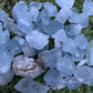 Back view of Grade AA Celestite raw showing natural surface