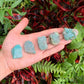 Profile shot of Amazonite raw stone, showing untreated character.