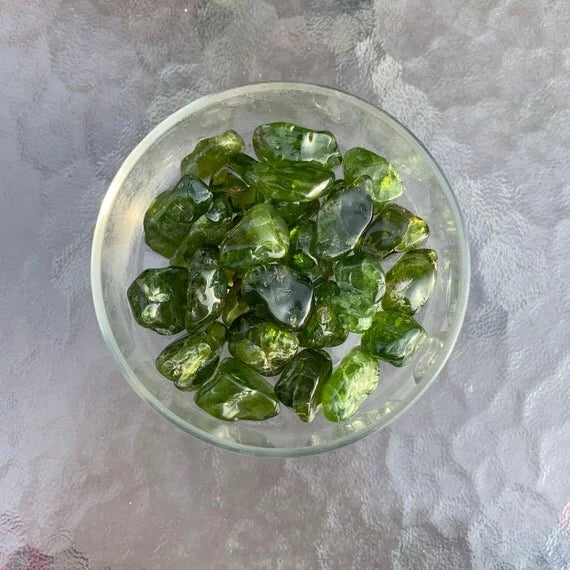 Full profile of Grade AA Peridot tumbled stone ready to ship from Beyond Bohemian
