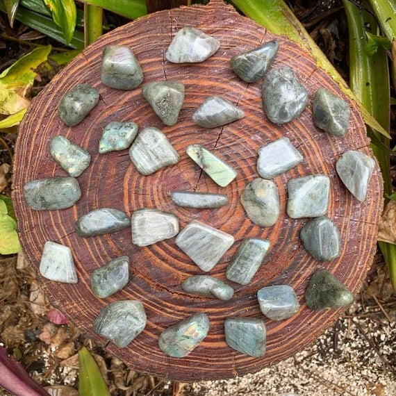 Back view of Grade AA Labradorite tumbled stone showing natural surface