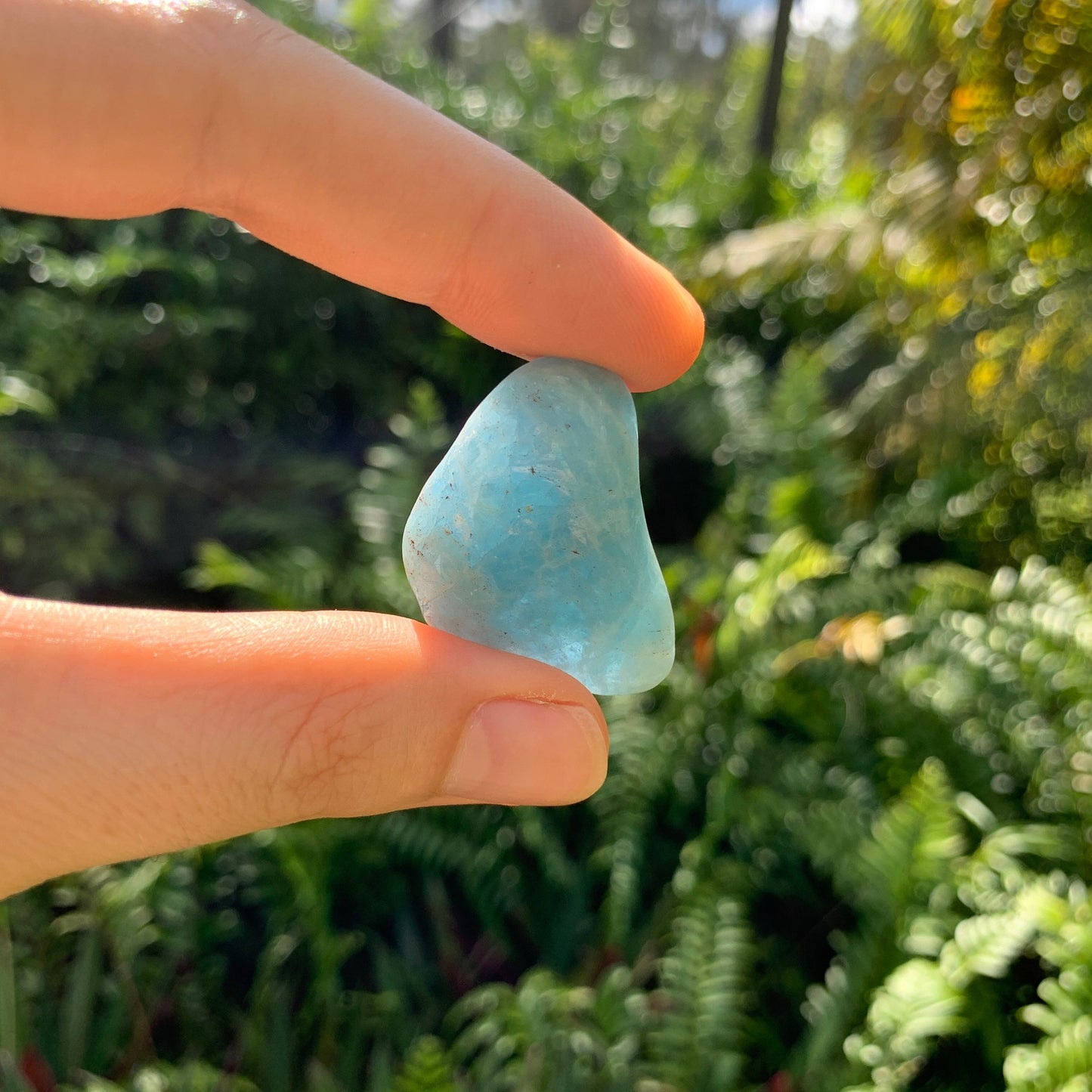Full profile of Grade AAA Aquamarine tumbled stone ready to ship from Beyond Bohemian