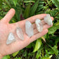 Top angle of Clear Quartz raw point, showing open form, United States-sourced.