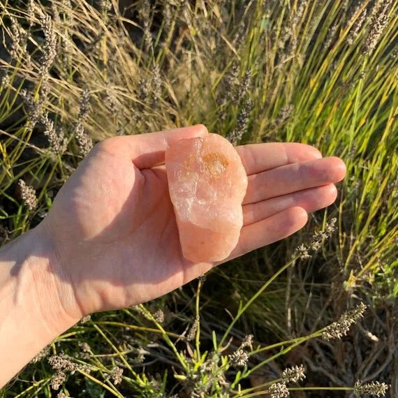 Back view of Grade A Rose Quartz raw showing natural surface