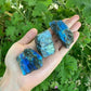 Color detail of Labradorite raw stone, often kept for Intuition and Protection, Madagascar-sourced.