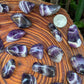 Full profile of Grade AA Chevron Amethyst tumbled stone ready to ship from Beyond Bohemian
