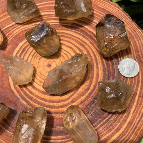 Edge view of Natural Citrine raw point, showing natural banding, from Brazil.