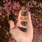 Full profile of Grade AAA Smoky Quartz tumbled stone ready to ship from Beyond Bohemian