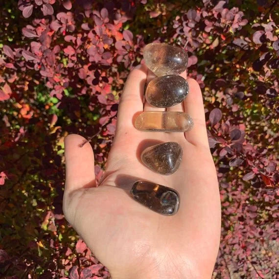 Close-up of Smoky Quartz tumbled stone from Brazil, soothing wellness stone for Stress Relief