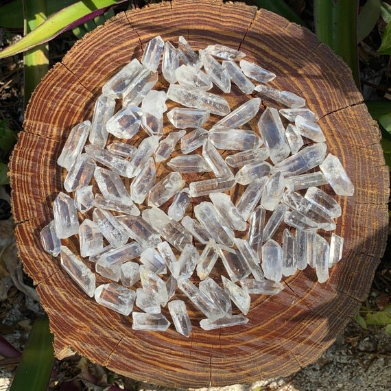Tabletop view of Lemurian Quartz raw crystal, showing natural surface character.