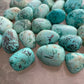 Full profile of Grade A Chrysocolla tumbled stone ready to ship from Beyond Bohemian