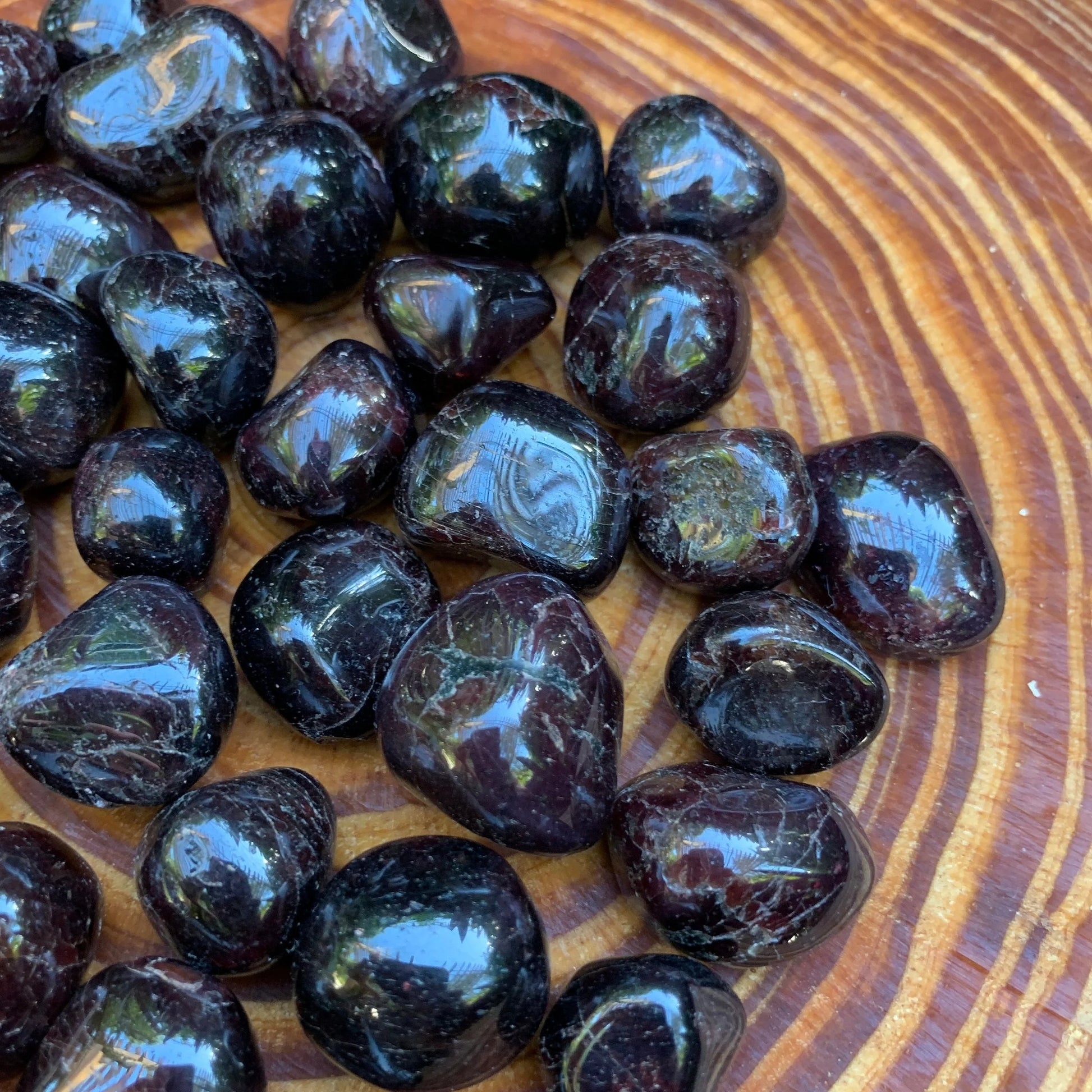 Full profile of Grade AA Garnet tumbled stone ready to ship from Beyond Bohemian