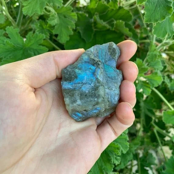 Held in palm of a Labradorite raw crystal, set to give a sense of weight.