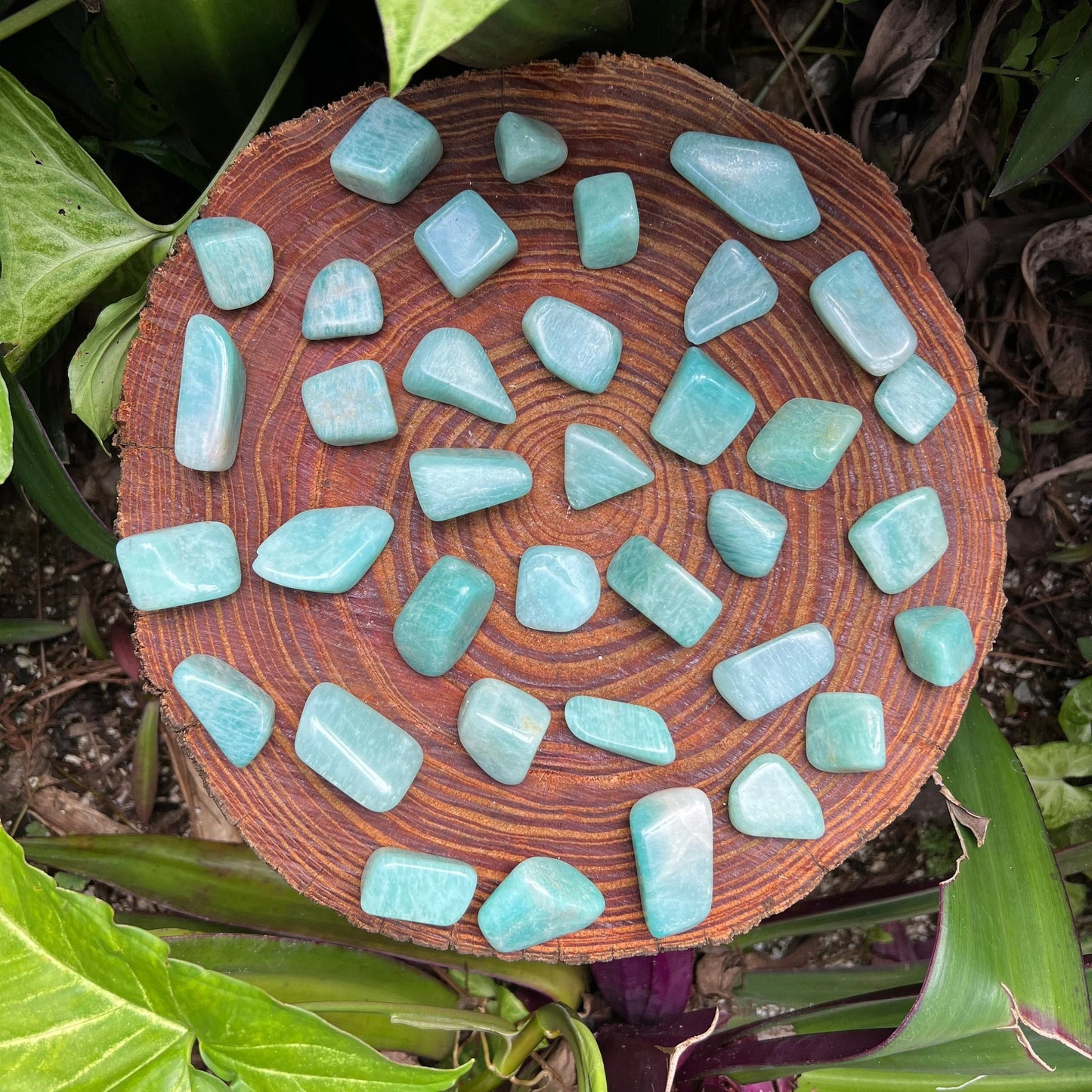 Detail of blue Amazonite tumbled stone, often kept for Stress Relief, hand-selected from Zambezia, Mozambique.