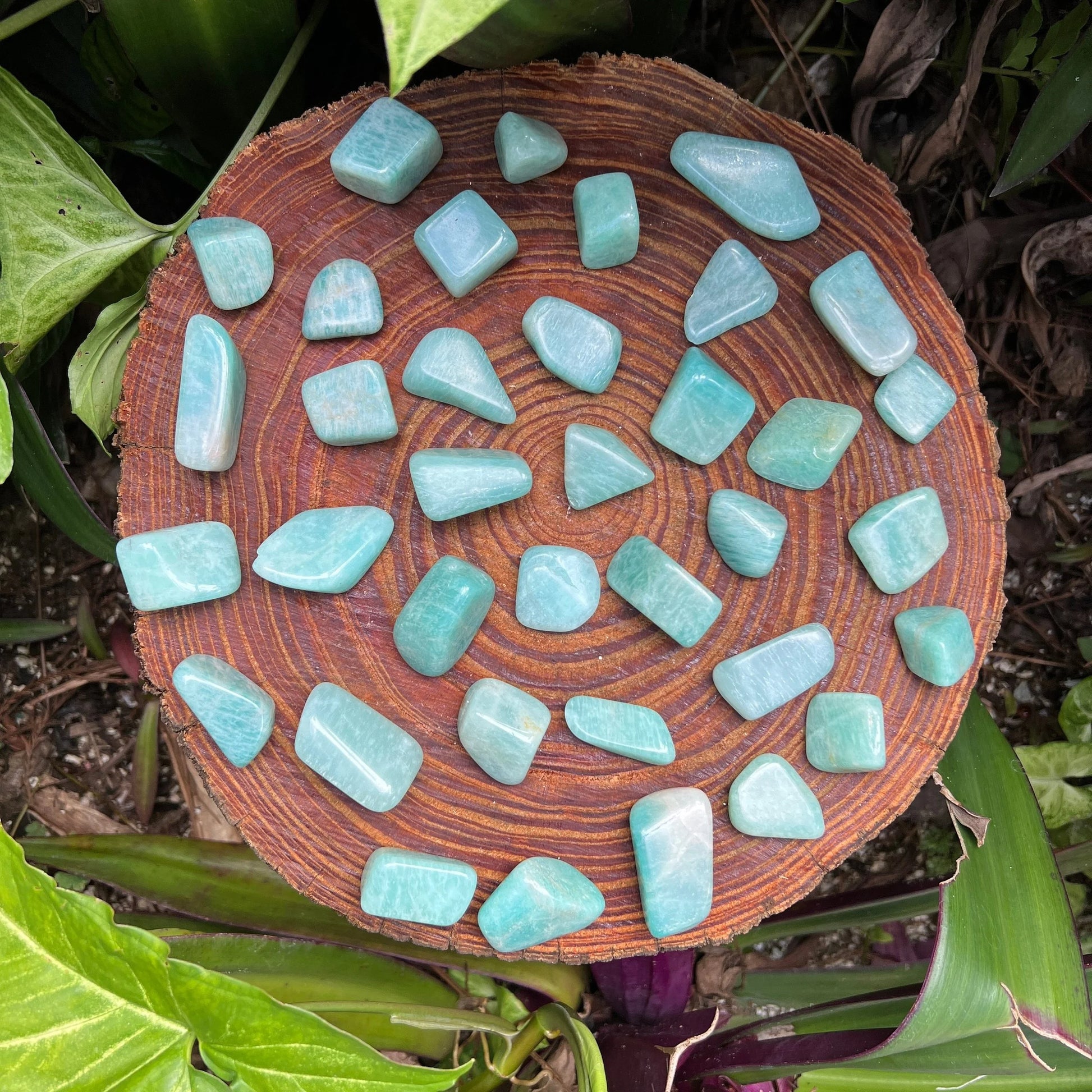 Detail of blue Amazonite tumbled stone, often kept for Stress Relief, hand-selected from Zambezia, Mozambique.