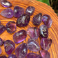 Full profile of Grade AAA Amethyst tumbled stone ready to ship from Beyond Bohemian