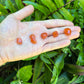 Full profile of Grade AA Carnelian tumbled stone ready to ship from Beyond Bohemian