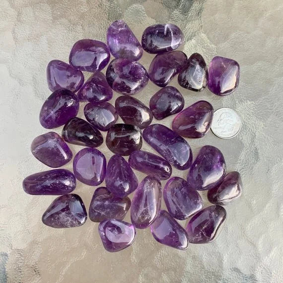 Overhead angle of Amethyst tumbled stone, from Brazil.