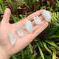 Reverse side of Clear Quartz raw point, often paired with practices around Cleansing and Meditation.