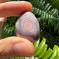 Full profile of Grade AA Pink Agate tumbled stone ready to ship from Beyond Bohemian