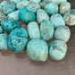 Full profile of Grade A Chrysocolla tumbled stone ready to ship from Beyond Bohemian